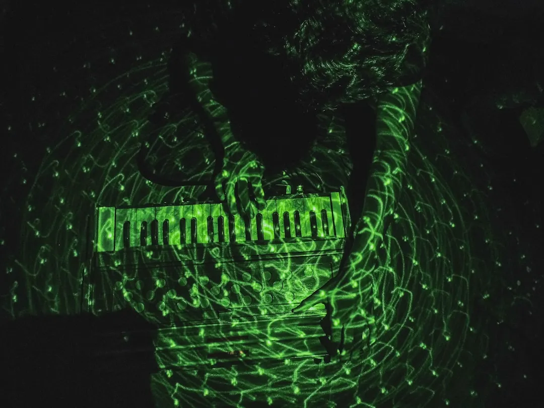 person playing electronic keyboard